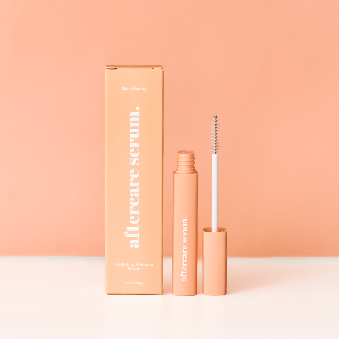 Aftercare serum packaging and applicator on a peach background